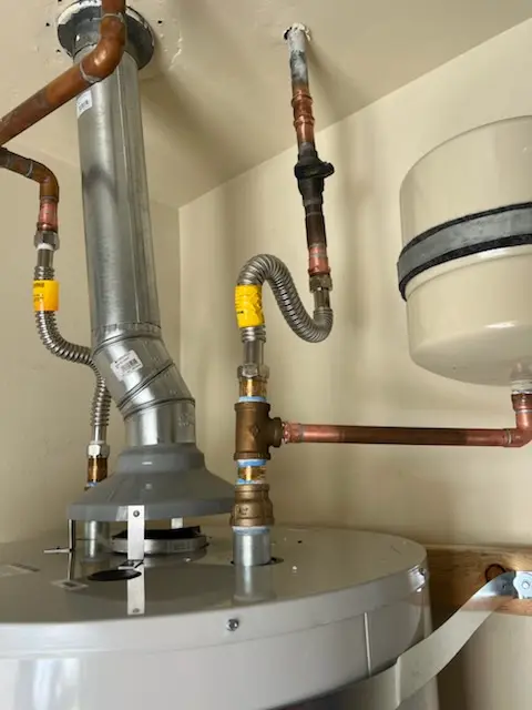 Water heater installation and plumbing repair in Cote Brilliant